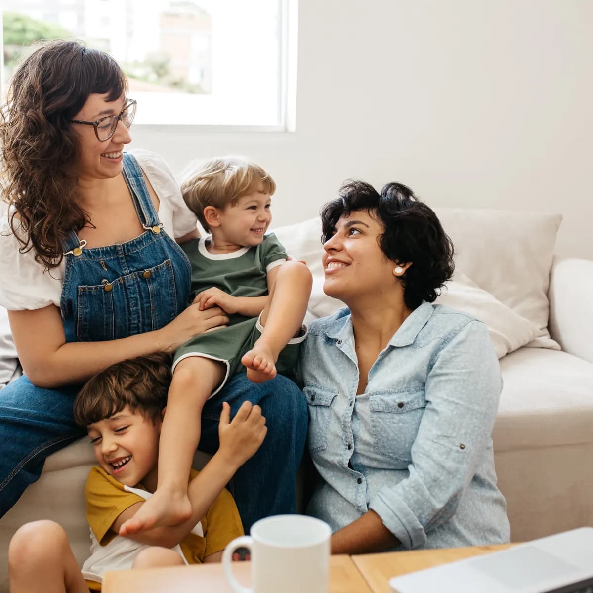 Two parents and their child sharing a joyful, connected moment