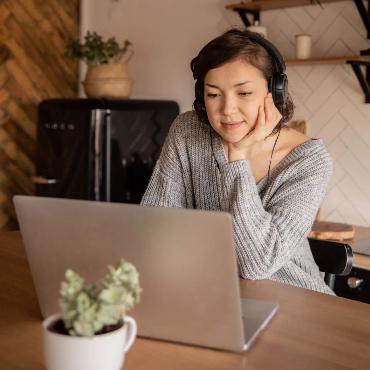 Woman in an online counselling session at home