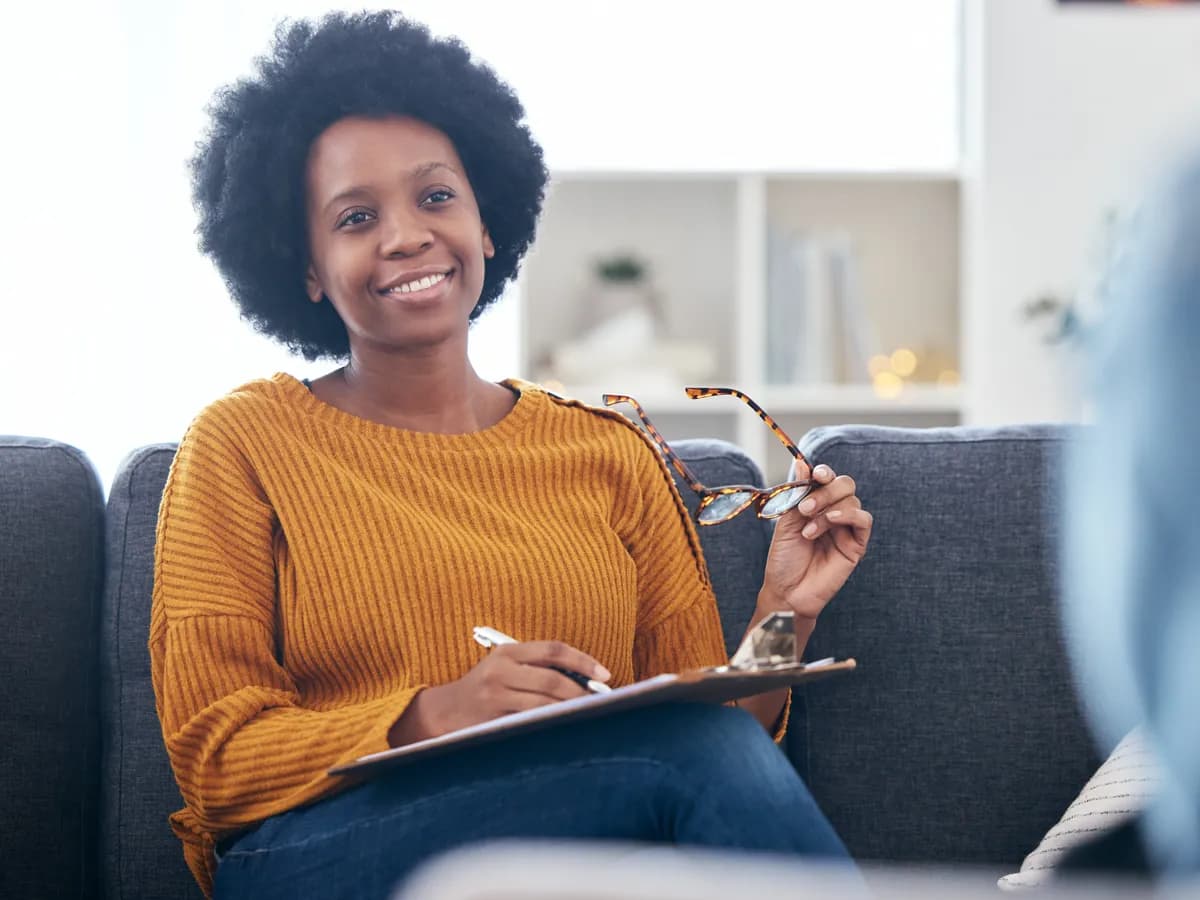 Woman in therapy exploring early attachment and relationship patterns